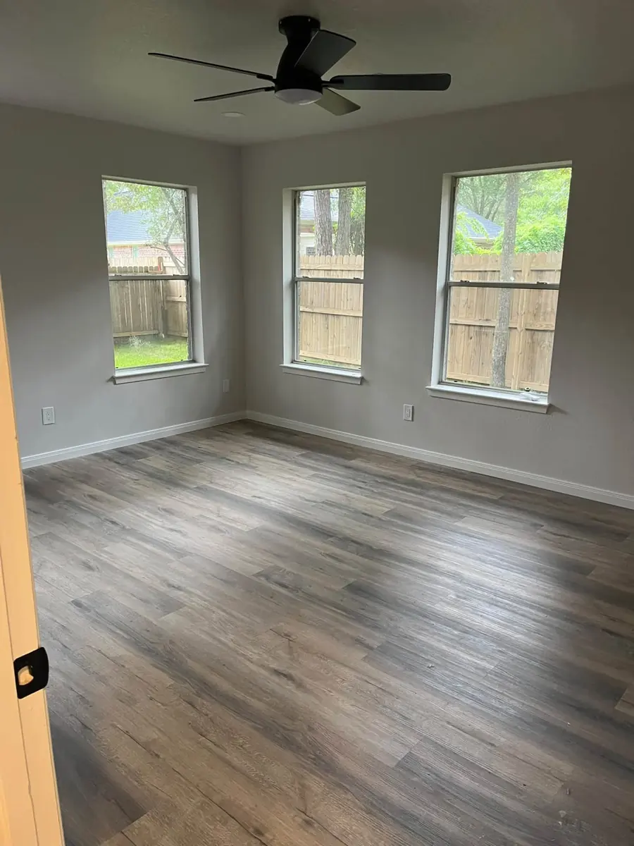Finished room with new plank flooring