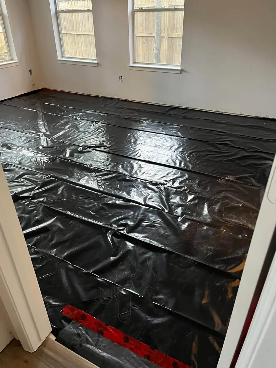 Vapor barrier laid with red seam tape